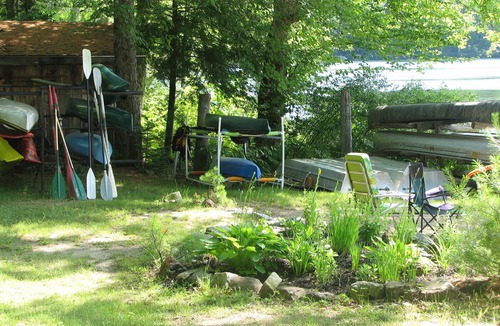Norway Cabin | Cozy Cedar Log Cabin on Pristine Sand Pond in Norway, great for swimming.