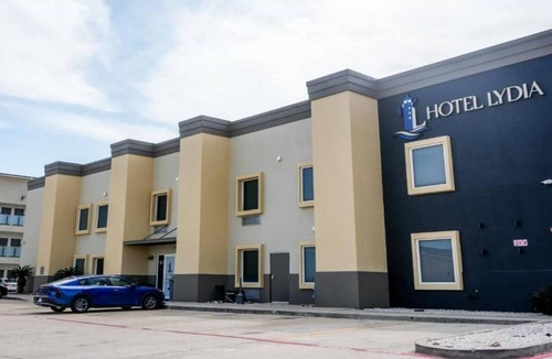 Port Aransas Apartment | Deluxe Two Queen Room