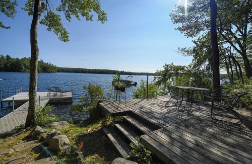 Harrison House | Designer Lakefront Retreat with Panoramic Sunset Views