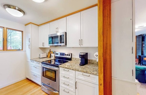Southwest Harbor House | Dog-friendly ocean-view duplex with wood stoves, decks, grills, kitchens, ACs