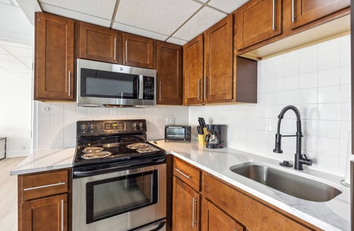 Central Business District Apartment | East 116 I Corporate 1Bd Suite in Rochester I Gym
