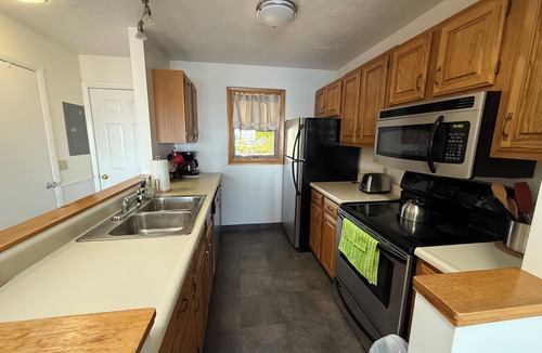 Southwest Harbor Condo | Enjoy the stunning ocean view from the hot tub at Port!
