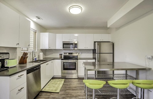 Millcreek House | Exclusive use hot tub w/fenced yard!