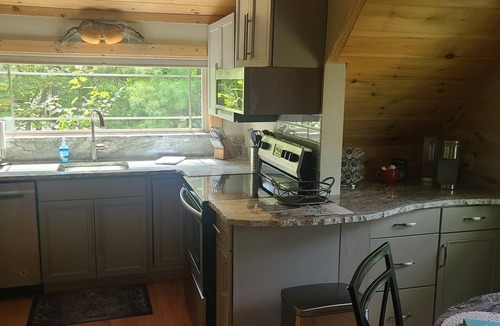 Lake Lure House | Fabulous 2-bedroom house with Boathouse and Screened Porch on charming Lake Lure