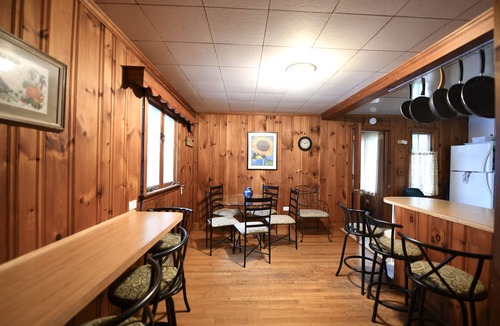 South Casco House | Family compound on Thomas Pond featuring main house and two small cottages.