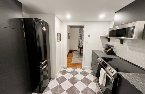 Grandview Heights Condo | Garden Suite - Sauna + King Bed! -Central location