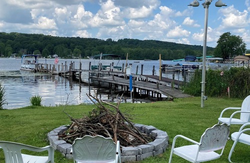 Canadohta Lake Cottage | Goldfinch Cottage: Cozy Rustic Lakefront Escape at The Pier, Perfect for 2!