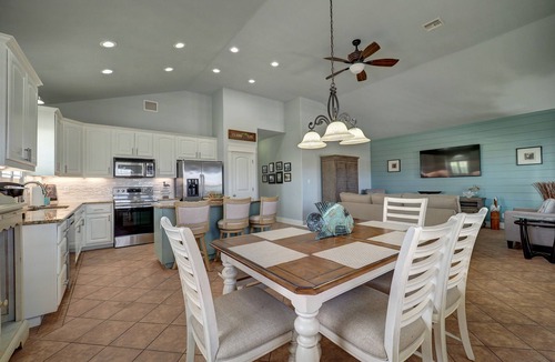 Leeward Sands House | Golf Cart friendly Coastal Oasis! Spacious, Near Beach, Fishing, Shops & Pool!