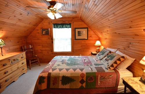 Inlet Cabin | Gorgeous view of the lake from a private deck along with 160 feet of sandy beach