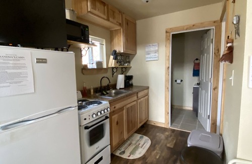 Winslow House | Grandma's cabin nestled in a little woodland village – playground, pond and more