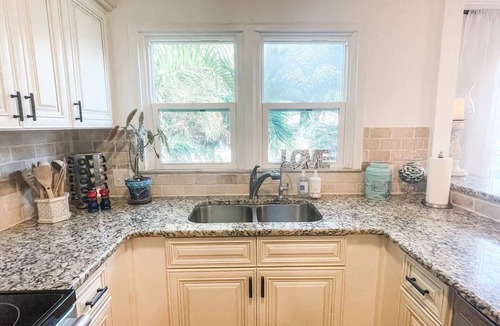 Arlington Park House | Heated pool home 5 min to downtown sleeps up to 8. Pet friendly!