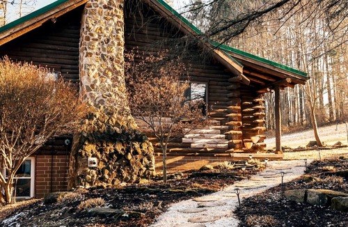 Butler Cabin | Inground Pool, Hot Tub, Fire Pit at Large Log Cabin near Mohican State Park