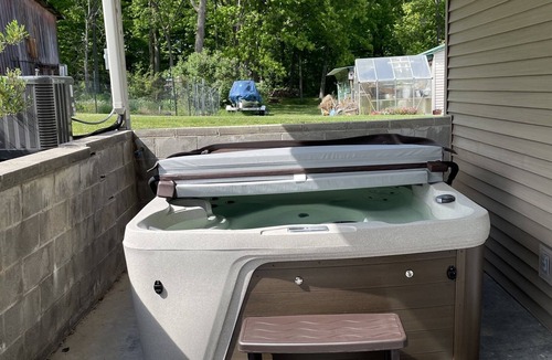 Town of Milo House | Lake front 7-bedroom house with movie theatre, hot tub, and game room!