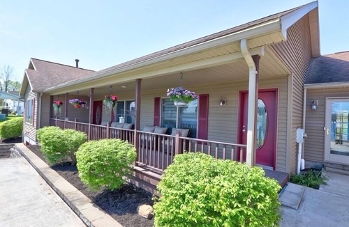 Town of Milo House | Lake front 7-bedroom house with movie theatre, hot tub, and game room!