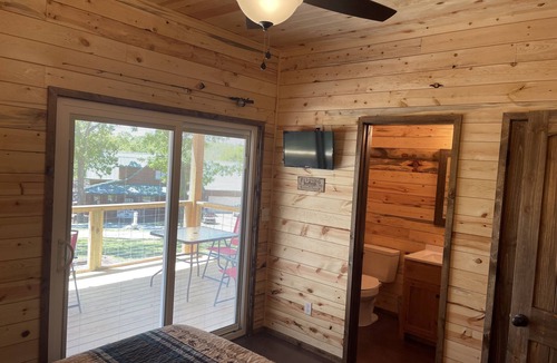 Grove Cabin | Lake view 2 bedroom cabin that sleeps 6. Private deck and fire pit area.