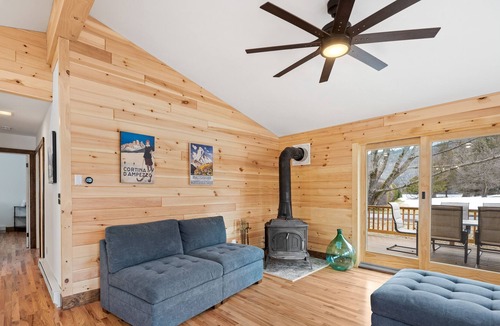 Silver Bay House | Lake-view home with large deck, grill, lawn, & mtn views - dog-friendly