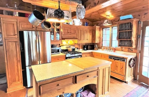 Butternut Ski Chalet | Lakefront 3BR, 2BA cottage with dock, boat, and fire pit