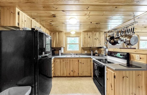 Greenville Cabin | Lakefront cabin on First Roach Pond with dock, lake view & firepit- dog-friendly