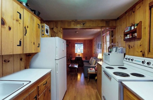 Greenville Junction Cabin | Lakefront cabin with private dock & beach access