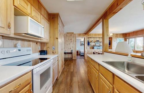 Greenville House | Lakefront home with private dock, mooring, pebble beach, grill, & firepit