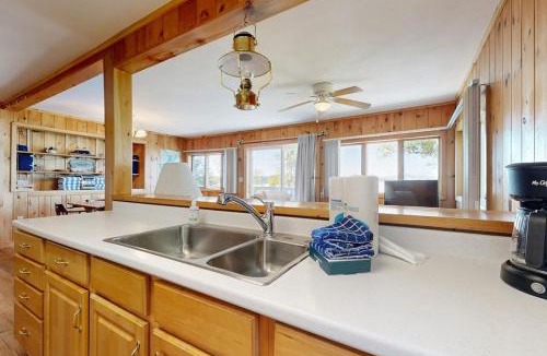 Greenville House | Lakefront home with private dock, mooring, pebble beach, grill, & firepit