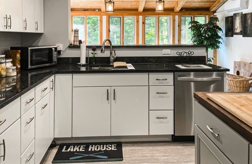 Mariaville House | Lakefront home with firepit, deck, seasonal lake access, fast WiFi, grill, views