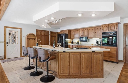 Burdett House | Lakefront Seneca Lake retreat with a private beach, dock, hot tub, and game room. Minutes from wineries and Watkins Glen. Pet friendly.