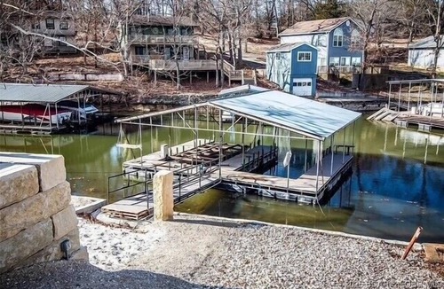 Roach House | Lakefront w/Private Dock, 2 Slips, Swim Mat, Firepit, & Covered Patio 44mm