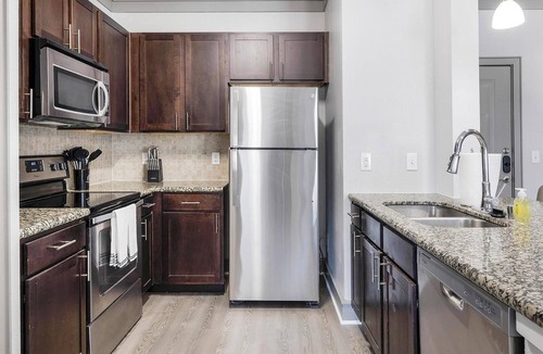 Northeast Carrollton Apartment | Landing | Chic 3BD, Clubhouse