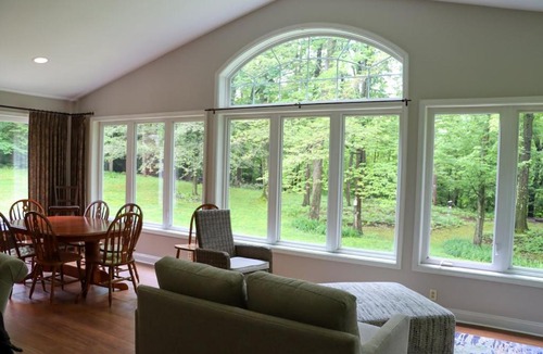 Erie House | Large home with hot tub in serene wooded setting