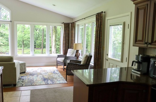 Erie House | Large home with hot tub in serene wooded setting