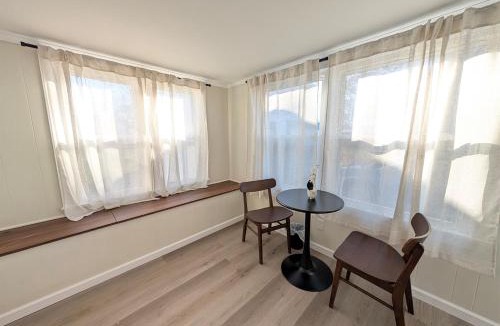 Norwalk House | Modern Norwalk Retreat 2 King Suites Sunroom
