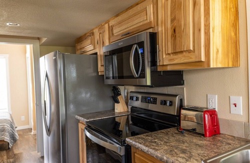 Satin Cabin | Modern Tiny Cabin on 550-acre Ranch, ATV, & Safari.