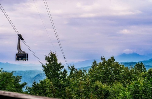 Chalet Village Cabin | Mountain View Log Cabin: 5 Min to DT Gatlinburg! Game Room| Resort Pool| Hot Tub
