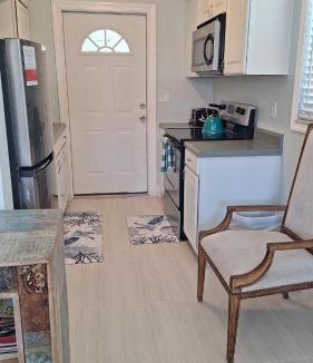 Naples Park Apartment | Near Beach Walk and Bike everywhere FENCED BACKYARD