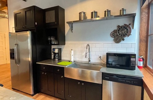 Downtown Rochester Apartment | NEW TO VRBO: Industrial History with a Modern Day Design Loft Apartment