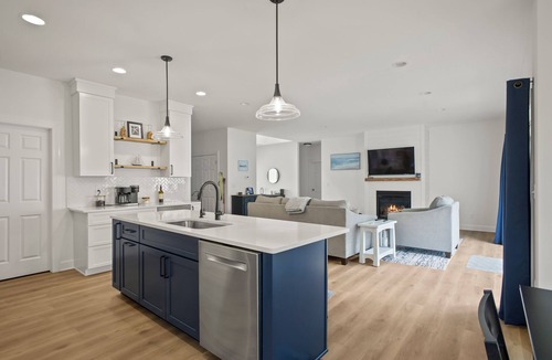Malta House | Newly built, open-concept spacious home by the water. 10 minutes to the track.