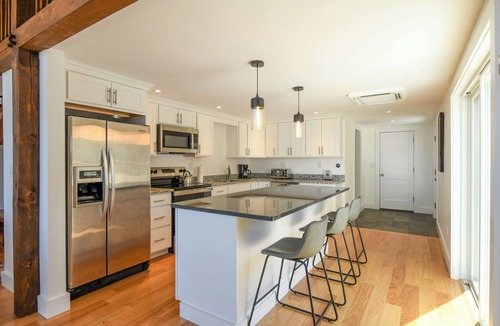 Harrison House | * NEWLY RENOVATED * Modern 4-bedroom home on Long Lake with sunset views!