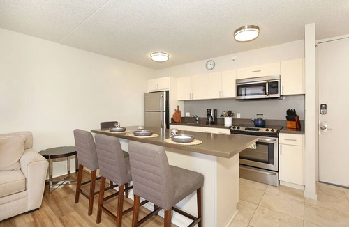 Waikiki Condo | Partial Ocean View, one-bedroom with AC, Wi-Fi, parking, short walk to beach!