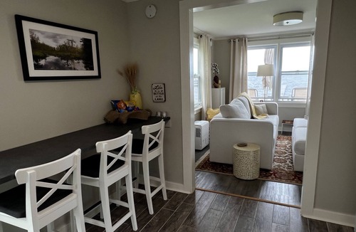 Bernhards Bay Cottage | Peaceful couples retreat on Oneida Lake. Insta-worthy views. Cozy interior.
