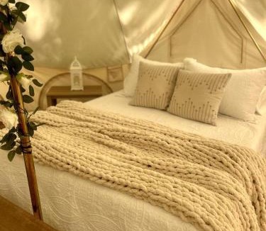 Gentry Other | Peaceful Glamping Tents with Elevated Decks, Cozy Fire Pit, and Secluded Forest Views Near Gentry, AR