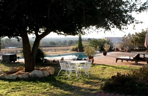 Paige Cabin | Pet-Friendly Accommodation on a Ranch in McDade, Texas