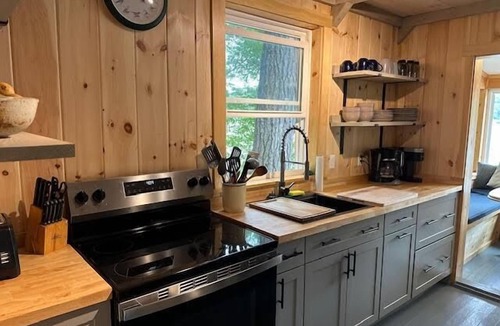 Harrison Cottage | Pet-friendly cottage on the edge of Crystal Lake with an unbeatable view!
