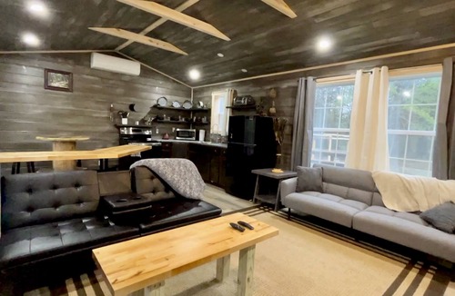 Marienville Cabin | Pin Oak at Forest Villas: Swing Fire Pit Cabin, Pet-Friendly, Cook Forest