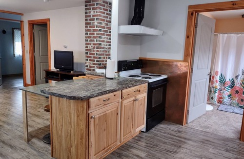 Caribou House | Prime location for snowsledders! Caribou, Maine - The Cottage
