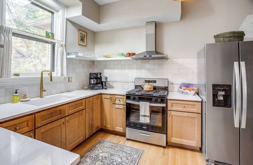 East Avenue Apartment | Private Suite with King Bed, Steps from Park Ave and East Ave!