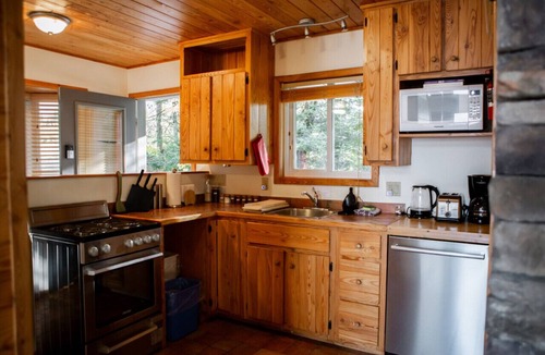 Port Carmen Cottage | Private Waterfront Cottage w/Large Dock & Hot Tub