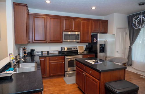 Indianapolis House | Quiet Indy 3-bedroom townhome with a cozy basement.