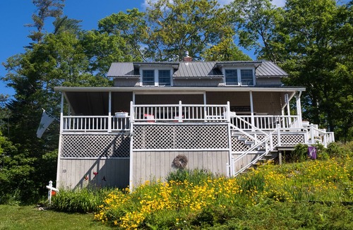 Bayville Cottage | Redbird Cottage. Charming respite w/large wrap-around porch and ocean views