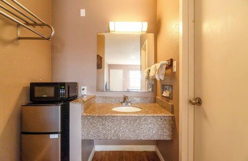 Sweet Home Hotel | Rest Easy in a Fresh, Clean Room with Quick Highway Access in Yoakum.